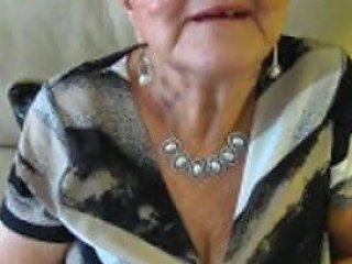 An Elderly Woman In Her Eighties Is Shown To Be Completely Free Of Any Cleavage Showing.